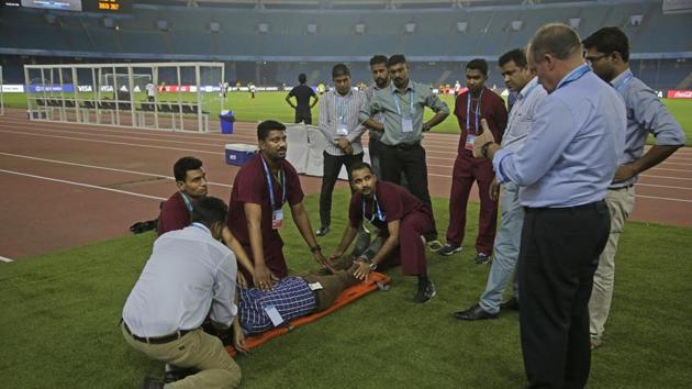 Paramedics undergo a mock drill to evacuate injured at Jawaharlal Nehru Stadium, one of the venues for the FIFA U-17 World Cup/ (AP)