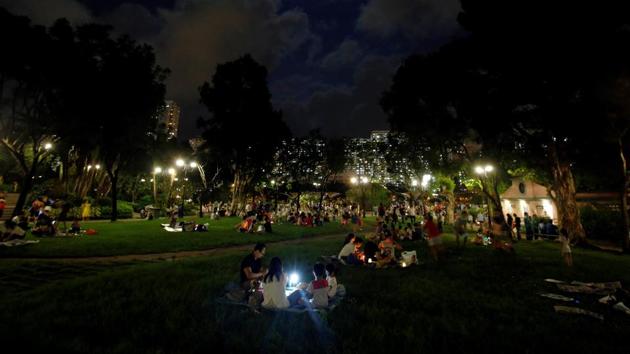 The Mid-Autumn festival is the second largest festival, only second to the Spring Festival and a time when people feast gazing under the full moon. (Bobby Yip / REUTERS)