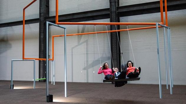 There are 22 three-person swings carefully arranged so that the visitors using it do not collide with each other. (Jack Taylor / Getty Images)