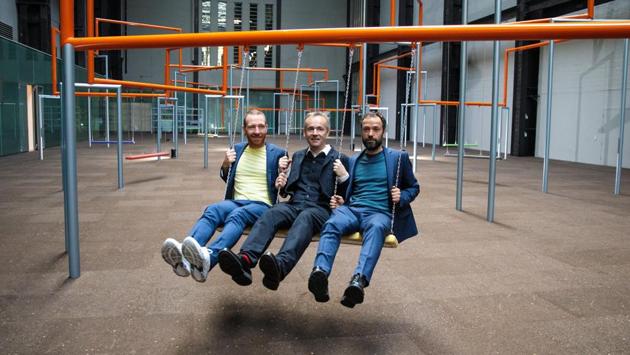 Members of the Danish collective Superflex (L-R) Jakob Fenger, Rasmus Nielsen and Bjornstjerne Christiansen pose during their Turbine Hall Installation at the Tate Modern in London. The trio have been working together since 1993 and are the latest artists to fill one of the most daunting and prestigious contemporary art spaces in the world. (Jack Taylor / Getty Images)