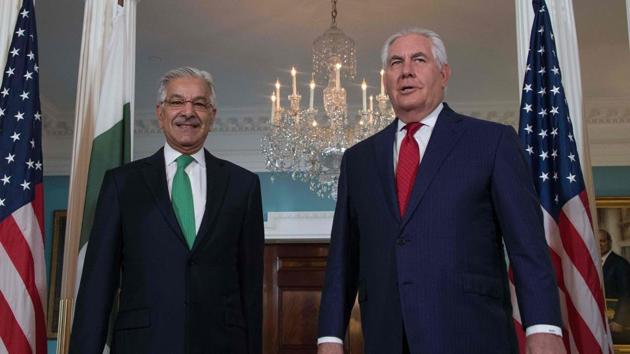 US secretary of state Rex Tillerson speaks with Pakistan foreign minister Khawaja Asif at the state department in Washington on October 4, 2017.(AFP)