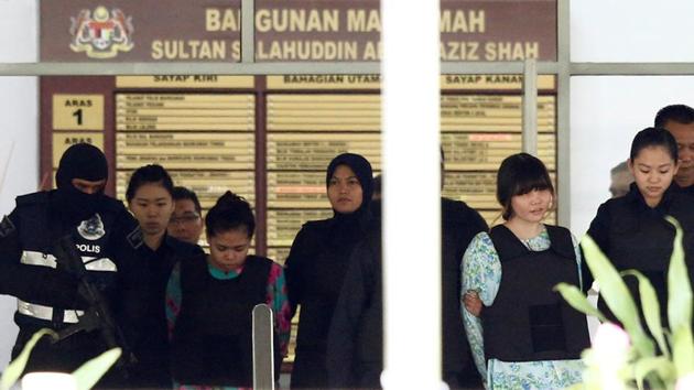 Vietnamese Doan Thi Huong and Indonesian Siti Aisyah who are on trial for the killing of Kim Jong Nam, the estranged half-brother of North Korea's leader, are escorted as they leave the Shah Alam High Court on the outskirts of Kuala Lumpur, Malaysia on October 3. (REUTERS) Vietnamese Doan Thi Huong and Indonesian Siti Aisyah who are on trial for the killing of Kim Jong Nam, the estranged half-brother of North Korea's leader, are escorted as they leave the Shah Alam High Court on the outskirts of Kuala Lumpur, Malaysia on October 3. (REUTERS)