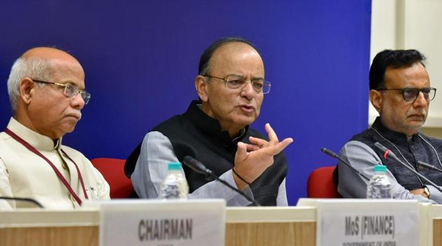 Finance minister Arun Jaitley (centre) with MoS for Finance Shiv Pratap Shukla (left) and revenue secretary Hasmukh Adhia (right) addressing media after the 22nd meeting of the GST Council in New Delhi on Friday. (PTI Photo) Finance minister Arun Jaitley (centre) with MoS for Finance Shiv Pratap Shukla (left) and revenue secretary Hasmukh Adhia (right) addressing media after the 22nd meeting of the GST Council in New Delhi on Friday. (PTI Photo)