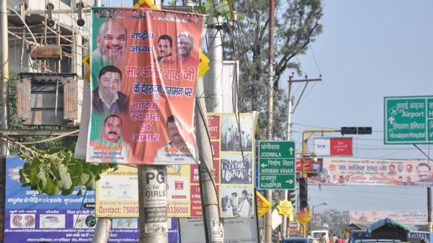 Posters and banners welcoming BJP chief Amit Shah are all over in Dehradun.(Vinay Santosh Kumar/HT) Posters and banners welcoming BJP chief Amit Shah are all over in Dehradun.(Vinay Santosh Kumar/HT)