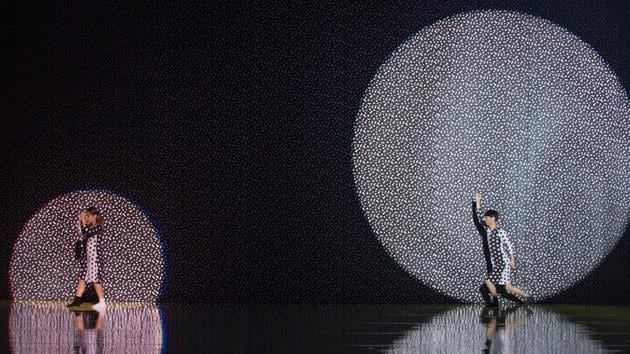 Using textured backgrounds and minimalist lighting, the show set itself apart from other recitals. (Thierry Zoccolan / AFP)