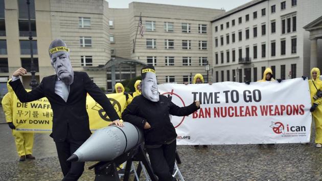 Activists of the International Campaign to Abolish Nuclear Weapons (ICAN) protest against the conflict between North Korea and the USA with masks of Kim Jong Un and Donald Trump in front of the US embassy in Berlin, Germany.(AP File Photo) Activists of the International Campaign to Abolish Nuclear Weapons (ICAN) protest against the conflict between North Korea and the USA with masks of Kim Jong Un and Donald Trump in front of the US embassy in Berlin, Germany.(AP File Photo)