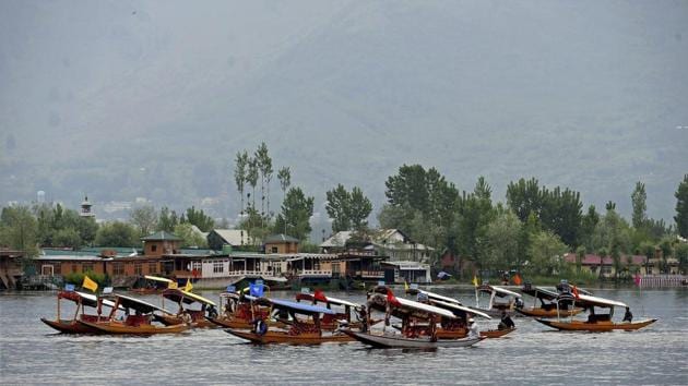 Boatmen row their boats during the Shikara festival, Dal Lake, Srinagar, May 2. The festival was organised by Jammu and Kashmir Tourism Department to promote tourism (Representative Photo)(PTI)