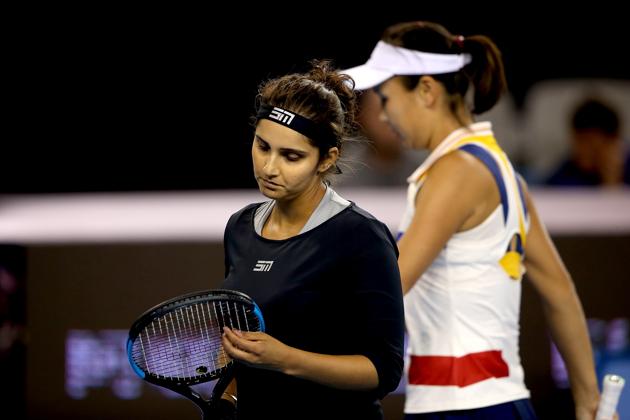 Sania Mirza and partner Peng Shuai of China react during their Women's double quarterfinal match against Katerina Siniakova of Czech Republic and Barbora Strycova of Czech Republic on Friday. The beat the Czech pair to enter the semis where they lost to Martina Hingis and Chan Yung-jan. (Getty Images) Sania Mirza and partner Peng Shuai of China react during their Women's double quarterfinal match against Katerina Siniakova of Czech Republic and Barbora Strycova of Czech Republic on Friday. The beat the Czech pair to enter the semis where they lost to Martina Hingis and Chan Yung-jan. (Getty Images)