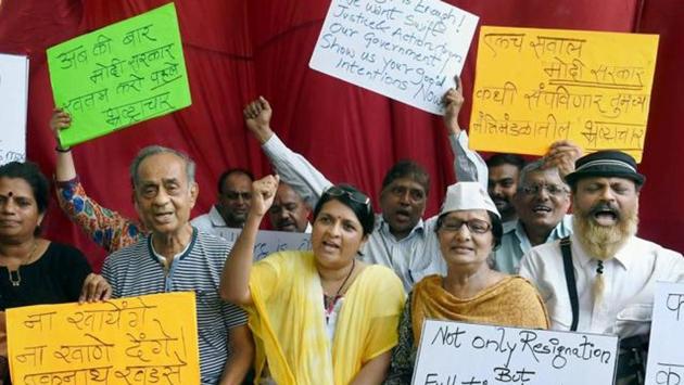 Anjali Damania (centre) and other activists demanding the resignation of BJP leader Eknath Khadse who was then Maharashtra’s revenue minister. (HT File) Anjali Damania (centre) and other activists demanding the resignation of BJP leader Eknath Khadse who was then Maharashtra’s revenue minister. (HT File)