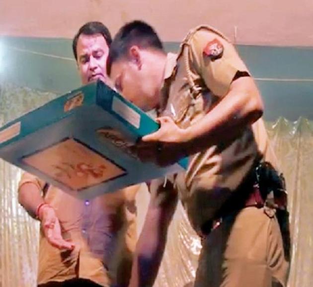 In the video, the SHO is seen touching the feet of the MLA. In the video, the SHO is seen touching the feet of the MLA.