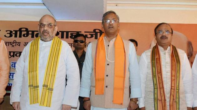 BJP President Amit Shah with Uttarakhand Chief Minister Trivendra Singh Rawat and other leaders at a party meeting in Dehradun on September 19. (PTI) BJP President Amit Shah with Uttarakhand Chief Minister Trivendra Singh Rawat and other leaders at a party meeting in Dehradun on September 19. (PTI)