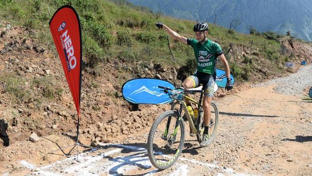 Adria Noguera of Spain celebrates as he wins the Hero MTB Himalaya mountain bike race at the finishing point in Dharamshala on October 7, 2017. (AFP / SAJJAD HUSSAIN) Adria Noguera of Spain celebrates as he wins the Hero MTB Himalaya mountain bike race at the finishing point in Dharamshala on October 7, 2017. (AFP / SAJJAD HUSSAIN)