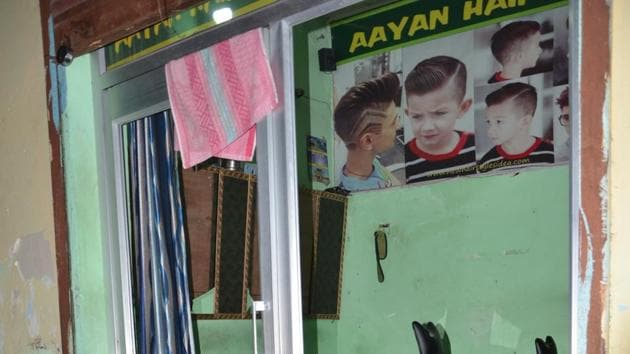 A barber’s shop ransacked by the group at Kankhal in Haridwar. (HT Photo)