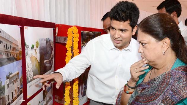 Ajmer collector Gaurav Goyal (left) with chief minister Vasundhara Raje in Ajmer on Saturday. (Deepak Sharma/HT Photo)