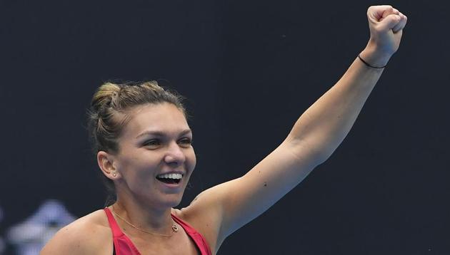 Simona Halep of Romania celebrates after winning her women's singles semifinal match against Jelena Ostapenko of Latvia at the China Open tennis tournament in Beijing on Saturday. (AFP) Simona Halep of Romania celebrates after winning her women's singles semifinal match against Jelena Ostapenko of Latvia at the China Open tennis tournament in Beijing on Saturday. (AFP)