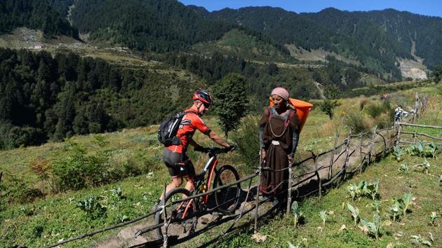 As many as 92 riders from 16 countries took part in the race, that cut through villages at the foothills of the Himalayas. The aim was to promote hygiene and eradication of open defecation, wherever they cycled through. (AFP / SAJJAD HUSSAIN) As many as 92 riders from 16 countries took part in the race, that cut through villages at the foothills of the Himalayas. The aim was to promote hygiene and eradication of open defecation, wherever they cycled through. (AFP / SAJJAD HUSSAIN)
