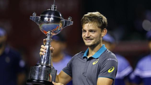 David Goffin of Belgium poses with the trophy after beating Adrian Mannarino of France during their men's singles final match of the Japan Open tennis tournament in Tokyo, Sunday, Oct. 8, 2017. (AP) David Goffin of Belgium poses with the trophy after beating Adrian Mannarino of France during their men's singles final match of the Japan Open tennis tournament in Tokyo, Sunday, Oct. 8, 2017. (AP)