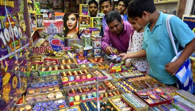 People buy firecrackers ahead of Dhanteras and Diwali in New Delhi in 2016. (Raj K Raj/HT file photo) People buy firecrackers ahead of Dhanteras and Diwali in New Delhi in 2016. (Raj K Raj/HT file photo)