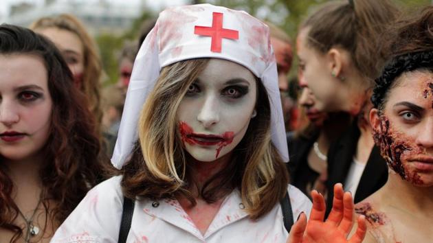 Participants attend the Zombie Walk in Paris on October 7, 2017. World Zombie Day is an international annual event. (AFP)