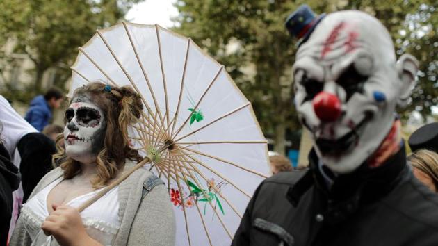 Participants attend the Zombie Walk in Paris on October 7, 2017. The walk started from Pittsburgh’s first ever Zombie Walk at Monroeville Mall in 2006 -- the setting for Dawn of the Dead. (AFP)