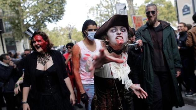 Participants attend the ‘Zombie Walk’ in Paris on October 7, 2017. (AFP)