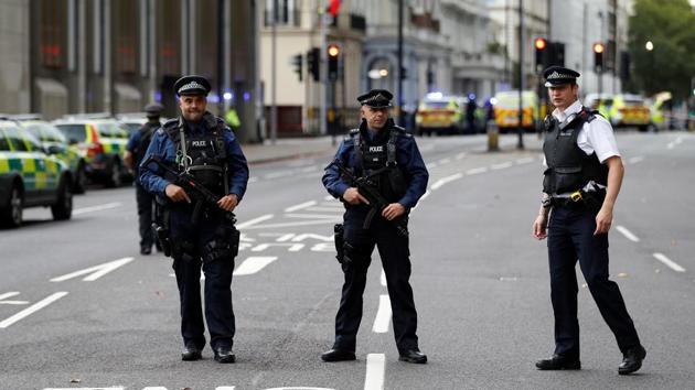 Police officers stand outside the Natural History Museum, after a car mounted the pavement injuring a number of pedestrians in London, on October 7, 2017. (Reuters)