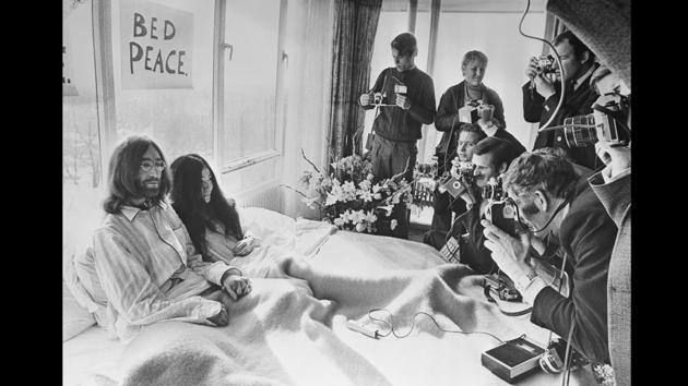 On 25th March 1969, John Lennon and his wife of a week, artist and activist Yoko Ono, received the press at their bedside in the Presidential Suite of the Hilton Hotel, Amsterdam. The couple stayed in bed for seven days ‘as a protest against war and violence in the world’. (Central Press / Getty Images)