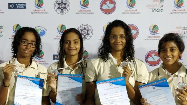The Pune women’s 4x100m relay team with their silver medals (HT PHOTO) The Pune women’s 4x100m relay team with their silver medals (HT PHOTO)