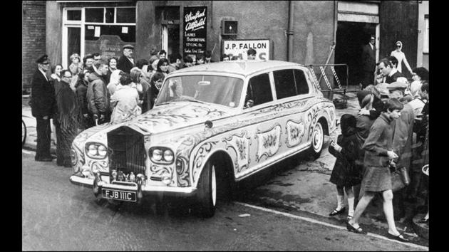 Seen driving out often in his customized Rolls Royce with fans on either side, this photograph is from Chertsey, Surrey, 1967. (Keystone / Getty images)