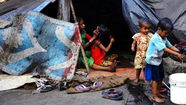 A family is excluded from the list if it owns a four-room home and any of these assets such as a car, air-conditioner or computer. (AFP File Photo) A family is excluded from the list if it owns a four-room home and any of these assets such as a car, air-conditioner or computer. (AFP File Photo)