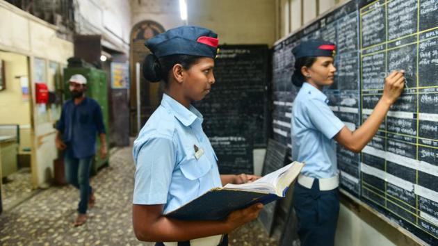 Firewoman Chhaya Pawar (extreme right) updating the duty roster at Byculla. (Aniruddha Chowdhury / Mint) Firewoman Chhaya Pawar (extreme right) updating the duty roster at Byculla. (Aniruddha Chowdhury / Mint)