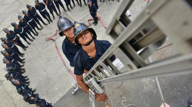 Women firefighters during a training drill at the Wadala fire station in Mumbai. Around 60-70 firewomen will begin work across Mumbai’s 34 fire stations by the end of this year. (Aniruddha Chowdhury / Mint) Women firefighters during a training drill at the Wadala fire station in Mumbai. Around 60-70 firewomen will begin work across Mumbai’s 34 fire stations by the end of this year. (Aniruddha Chowdhury / Mint)