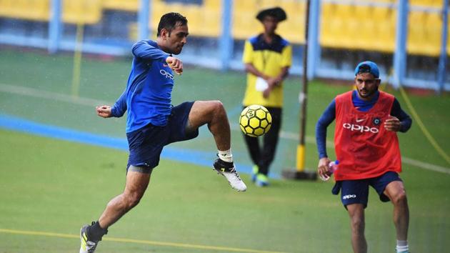 MS Dhoni showcased his fitness and football skills as India trained hard. (AFP)