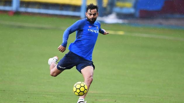 Rain interrupted the practice session but India continued with their training session. (AFP)