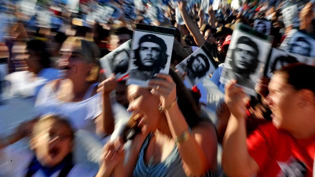 Cubans participate in the commemoration of the 50th anniversary of Ernesto ‘Che’ Guevara’s death at the Che Guevara Memorial in Santa Clara, Cuba. With US President Donald Trump dissolving various ties with Cuba, which were laid down by the Obama administration, tension between US-Cuba relations is on the rise. (Yamil Lage / AFP)