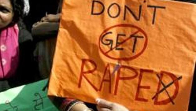People protest the rape of a teenager. (AP File Photo) People protest the rape of a teenager. (AP File Photo)
