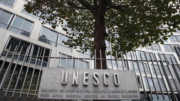 United Nations Educational Scientific and Cultural Organization logo is pictured on the entrance at UNESCO's headquarters in Paris, France. (AP File Photo) United Nations Educational Scientific and Cultural Organization logo is pictured on the entrance at UNESCO's headquarters in Paris, France. (AP File Photo)