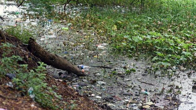 Garbage floating in Powai lake on Monday. (Shashi S Kashyap/ HT) Garbage floating in Powai lake on Monday. (Shashi S Kashyap/ HT)