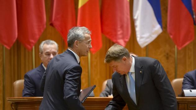 NATO Secretary General Jens Stoltenberg, left, shakes hands with Romania's President, Klaus Iohannis, during the NATO Parliamentary Assembly session in Bucharest, Romania. NATO's chief says the alliance does not want a "new Cold War" with Russia, despite members' concerns about Russian military buildup close to NATOs' border. (AP Photo) NATO Secretary General Jens Stoltenberg, left, shakes hands with Romania's President, Klaus Iohannis, during the NATO Parliamentary Assembly session in Bucharest, Romania. NATO's chief says the alliance does not want a "new Cold War" with Russia, despite members' concerns about Russian military buildup close to NATOs' border. (AP Photo)