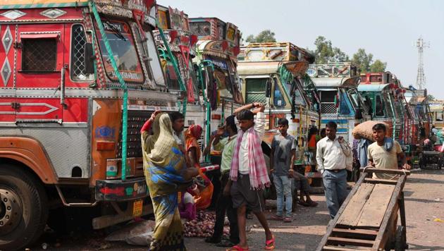 Trucks parked at the Azadpur Mandi in New Delhi on Monday. Truck operators across the country are on a two-day strike to protest against the goods and services tax, hike in fuel prices and several other issues.(PTI Photo)