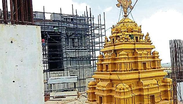 A sprawling 11-acre Yadadri temple complex that will consist of seven temple domes, including a 100-foot main dome, a 1,400 acre tourist facilities comprising cottages, multilevel parking, and housing for the temple priests.(HT Photo) A sprawling 11-acre Yadadri temple complex that will consist of seven temple domes, including a 100-foot main dome, a 1,400 acre tourist facilities comprising cottages, multilevel parking, and housing for the temple priests.(HT Photo)