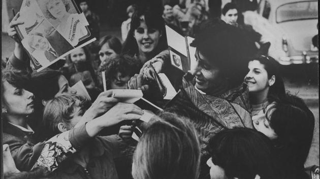 Amitabh Bachchan with fans at Tashkent. (HT File Photo) Amitabh Bachchan with fans at Tashkent. (HT File Photo)