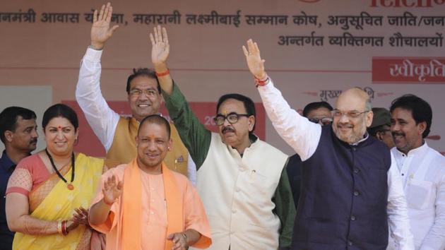 BJP national president Amit Shah, UP chief minister Yogi Adityanath and Union minister Smriti Irani on dais in Amethi on Monday. (Deepak Gupta /HT Photo) BJP national president Amit Shah, UP chief minister Yogi Adityanath and Union minister Smriti Irani on dais in Amethi on Monday. (Deepak Gupta /HT Photo)