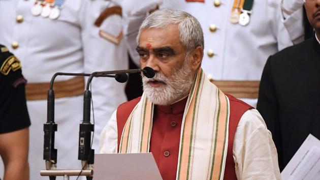 Ashwini Kumar Choubey takes the oath during the swearing-in ceremony of new ministers in New Delhi on September 3.(AFP Photo)