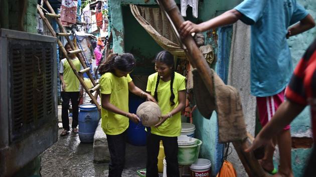 Rajkumari (L) plays in the girls team as a defender, while Amrita (R) plays as a right forward. While Rajkumari has set her eyes on being a policewoman, Amrita dreams of becoming a professional Bharatnatyam dancer when she grows up. (RAJ K RAJ / HT PHOTO)