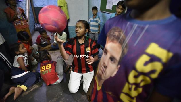 An under-11 team member, Nikki dribbles a football on her finger with ease. She’s keen to take up the sport professionally and also try her hand at fine art. ‘My Angels Academy’ has turned out to be a good gender-equal space, where sporting excellence thrives in an environment of love and care. (Raj K Raj/HT PHOTO)