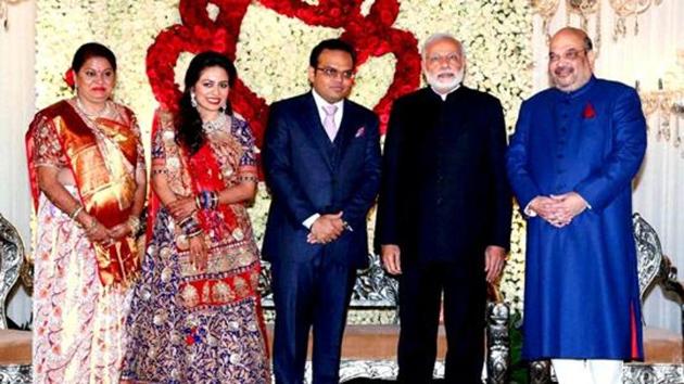 Prime Minister Narendra Modi with BJP national president Amit shah and his son Jay at his wedding reception in New Delhi. (PTI File Photo) Prime Minister Narendra Modi with BJP national president Amit shah and his son Jay at his wedding reception in New Delhi. (PTI File Photo)