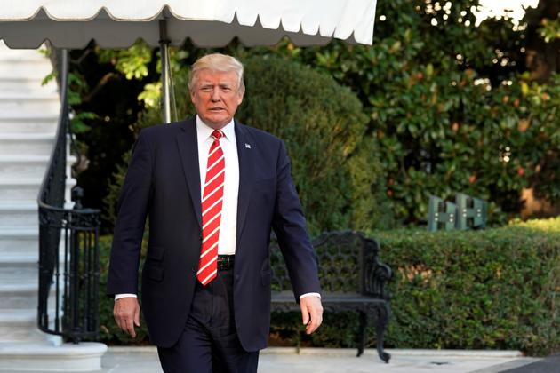 US President Donald Trump walks out from the White House in Washington on October 7, 2017. (REUTERS) US President Donald Trump walks out from the White House in Washington on October 7, 2017. (REUTERS)