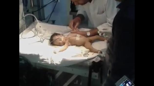 The infant died during treatment at hospital.(VIDEO GRAB)