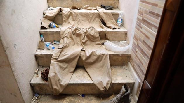 A uniform of a member of Islamic State militants is pictured as it was displayed by the Syrian Democratic forces at their positions inside a building at the frontline in Raqqa. Intense fighting since June and heavy US bombardment have left ISIS holed up with commanders saying the hospital and Al-Aswad Football Stadium, said to contain civilian hostages, will be where ISIS make their last stand. (Erik De Castro / REUTERS) A uniform of a member of Islamic State militants is pictured as it was displayed by the Syrian Democratic forces at their positions inside a building at the frontline in Raqqa. Intense fighting since June and heavy US bombardment have left ISIS holed up with commanders saying the hospital and Al-Aswad Football Stadium, said to contain civilian hostages, will be where ISIS make their last stand. (Erik De Castro / REUTERS)